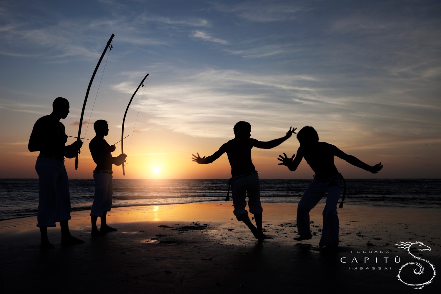 Capoeira players on the beach of Imbassai
